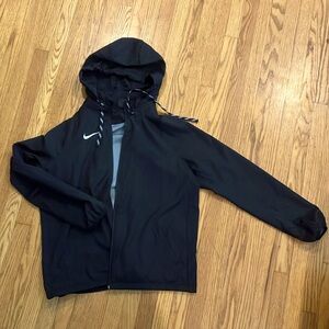 Black Nike women’s training full zip jacket. hood rolls into zipper, large